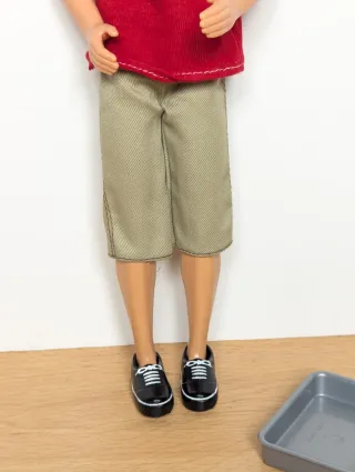 Muñeco Ken fotógrafo con cámara