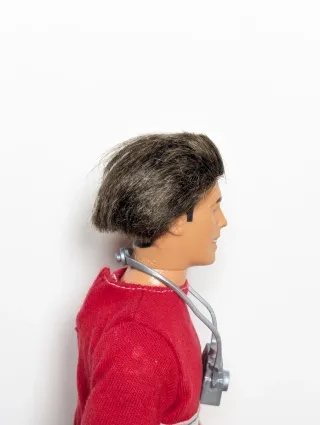 Muñeco Ken fotógrafo con cámara