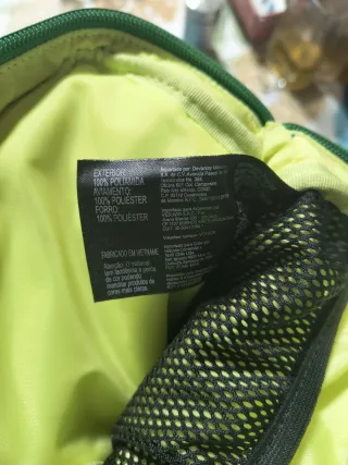 Bolso bandolera Lacoste unisex azul y verde.