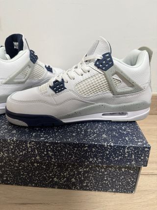 Jordan 4 Retro Blanco y Gris
