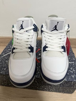Jordan 4 Retro Blanco y Gris