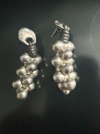 Pendientes Ciclon cuero y plata