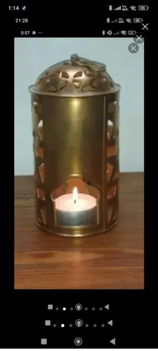 Grande portacandela in metallo dorato