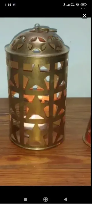 Grande portacandela in metallo dorato