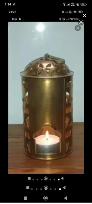 Grande portacandela in metallo dorato