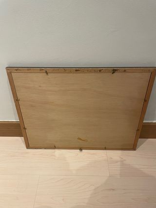 Elegante cornice in legno e metallo dorato