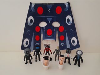 Figuras Coleccionables Skibidi Toilet y Cámara man