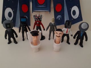 Figuras Coleccionables Skibidi Toilet y Cámara man