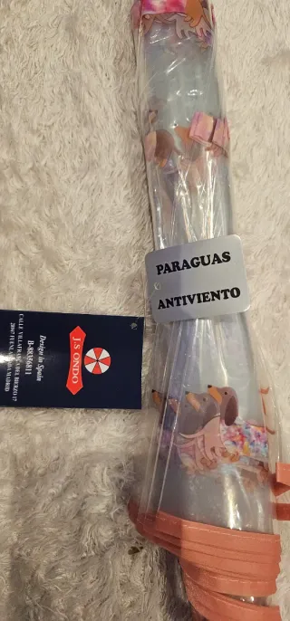 Paraguas transparente perro salchicha