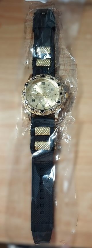 Reloj de cuarzo dorado y negro para hombre