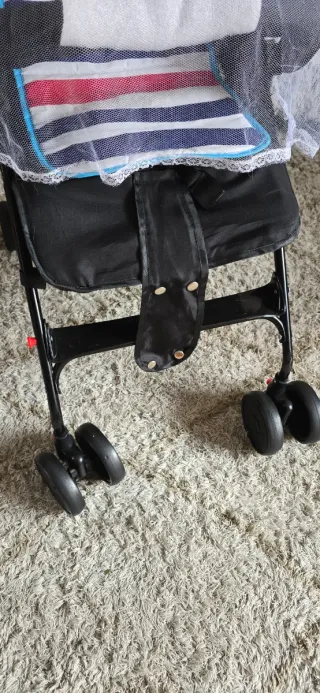 Carrito de bebé con mosquitera