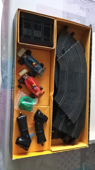 Scalextric GP 25 con sobre caja original exin
