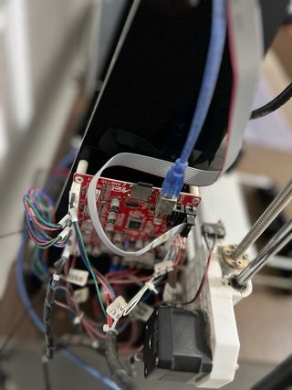 Impresora 3D Negra y Plateada