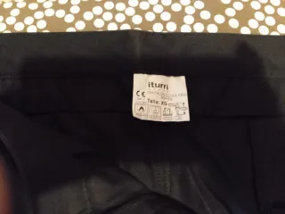 Pantalón de trabajo iturri negro/naranja de repsol