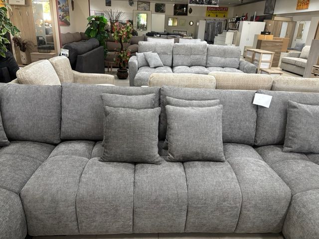 Sofá modular gris con doble chaise longue