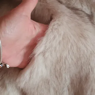 Giacca corta in pelliccia sintetica