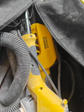 Lijadora de pared Stanley con bolsa