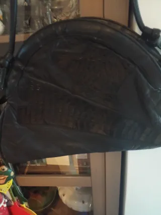 Bolso vintage negro tiene cremallera pero rota