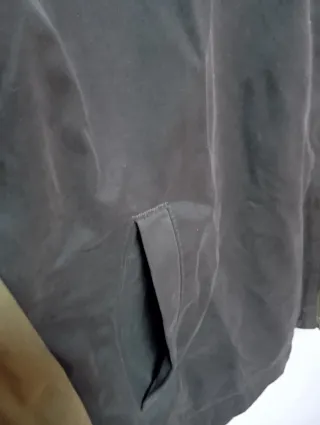 Chaqueta Kiabi verde y negra con capucha