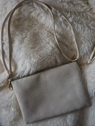 Bolso de mano con margarita