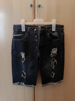 Pantalones cortos vaqueros rotos