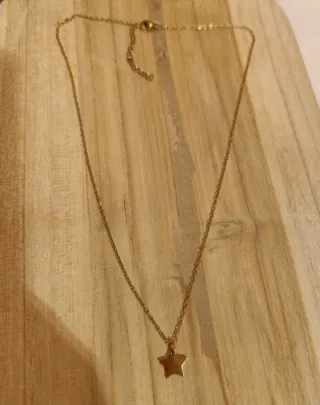 Colgante estrella dorado