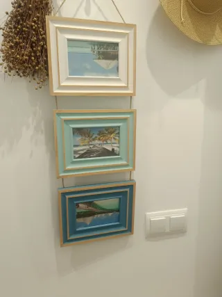 Cornice in legno per 3 foto