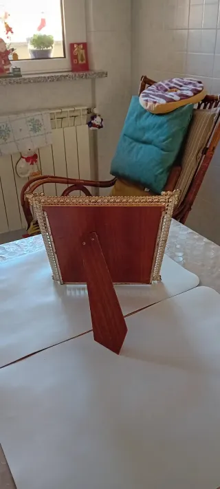 Cornice dorata con vetro