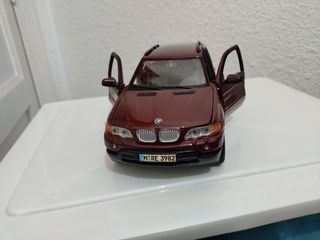 Coches a escala BMW X5 y Freelander 1:24