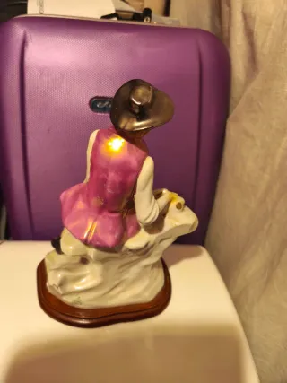 Figura de porcelana de un vaquero