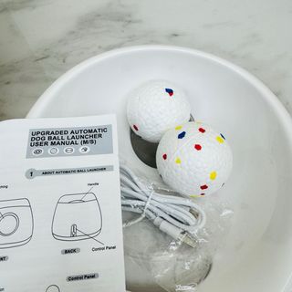 Lanciatore automatico palline per cani