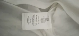 T-shirt bianca con applicazioni floreali