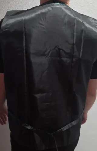 Chaleco unisex verde con estampado paisley