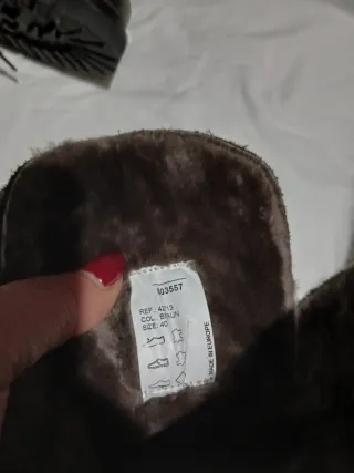 Stivali alti in pelle marrone e nero