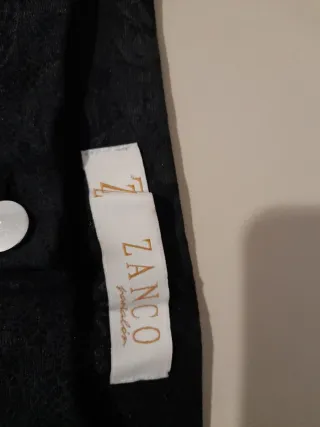 Pantalón elástico negro diseño encaje