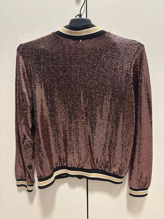 cazadora Bomber brillante rosa y dorado.