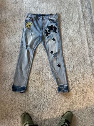 Pantaloni Amiri Uomo Jeans Strappati