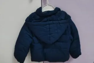 Piumino bambina blu con fiocchi