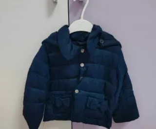 Piumino bambina blu con fiocchi