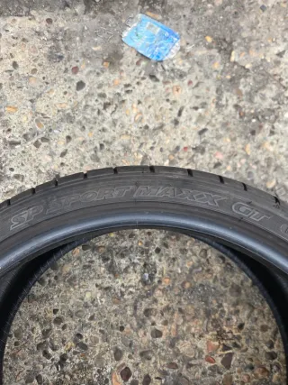 1 unidad dunlop 265-30-20- al 80% de vida.