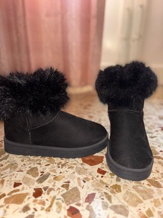 Stivali neri con pelliccia