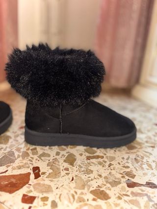 Stivali neri con pelliccia