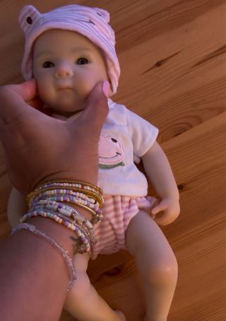 Bebé de silicona completa con accesorios 33 cm