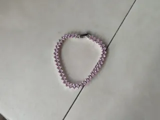 Pulsera de plata con piedras rosas