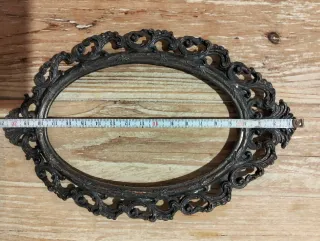 Cornice ovale in ottone