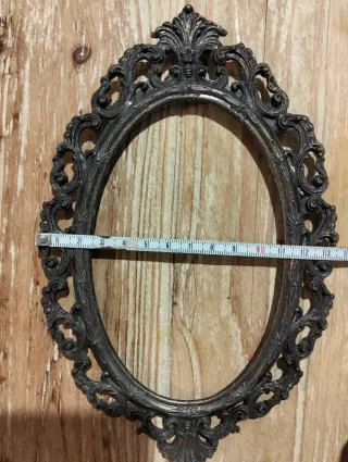 Cornice ovale in ottone