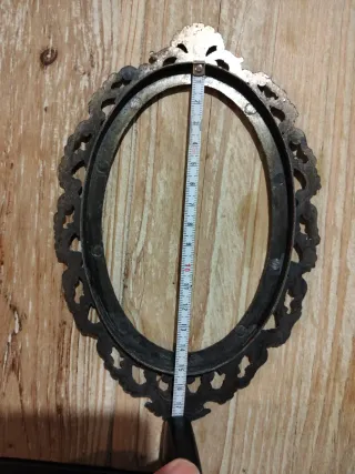 Cornice ovale in ottone