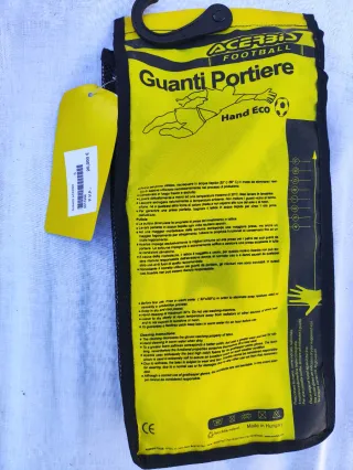 Guantes de portero Joma y espinilleras lotto.