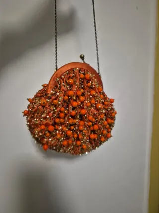 Borsa arancione con perline dorate