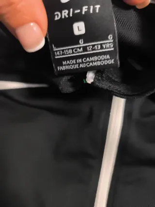 Conjunto de chándal  negro y blanco talla 13/14